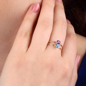 Anello in oro rosa 9K con topazio azzurro