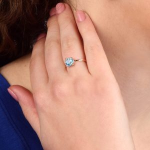 Anello Tutto Tondo in oro rosa 9k con topazio azzurro